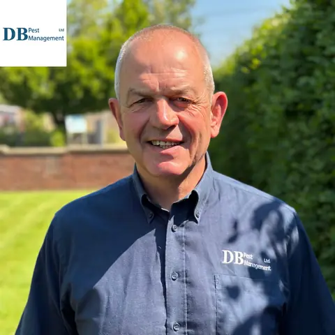 DB Pest Management owner in company uniform